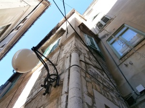 Always look up. These columns can be found on some of the buildings in Old Town Sibenik.  At the top of the columns sometimes you can find shields engraved.  This column tells you that the family who used to own the building were of nobility.  